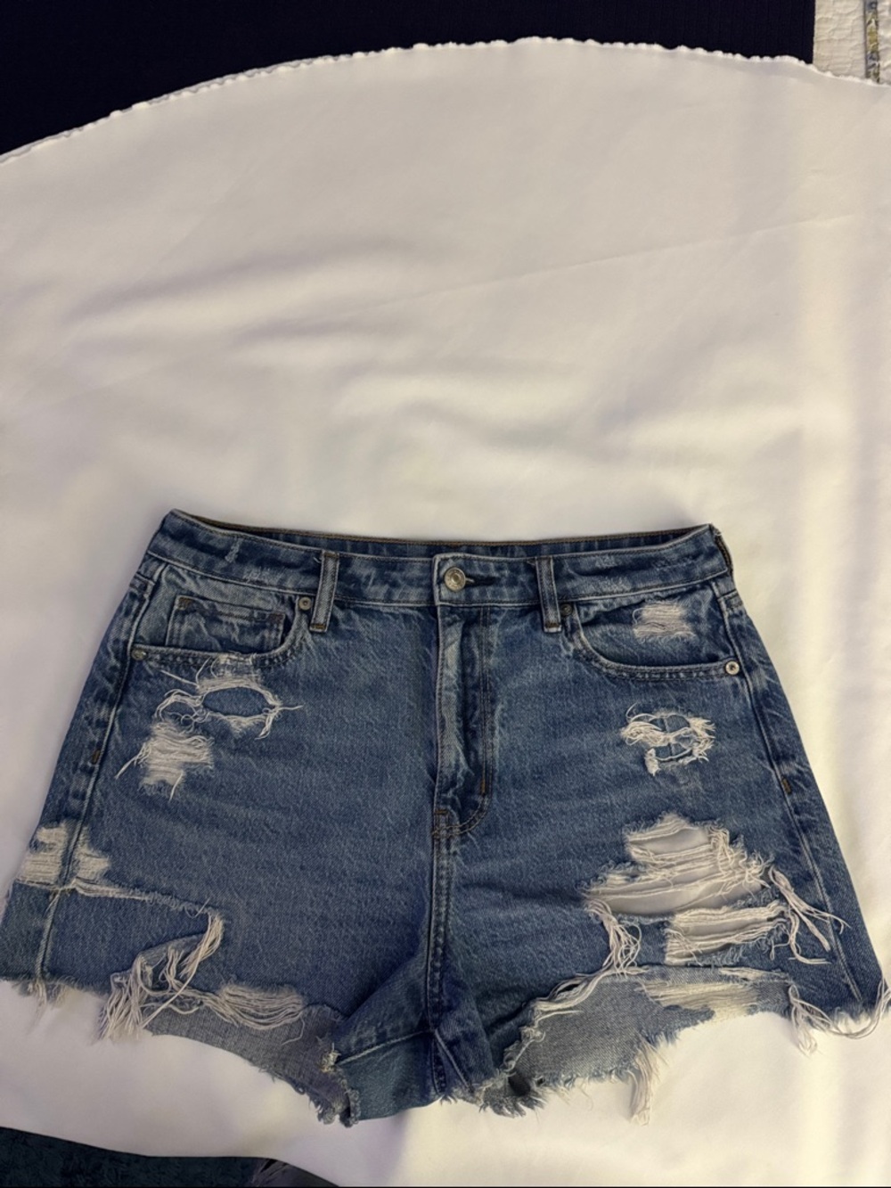 American Eagle distressed & frayed denim shorts.  Size 10